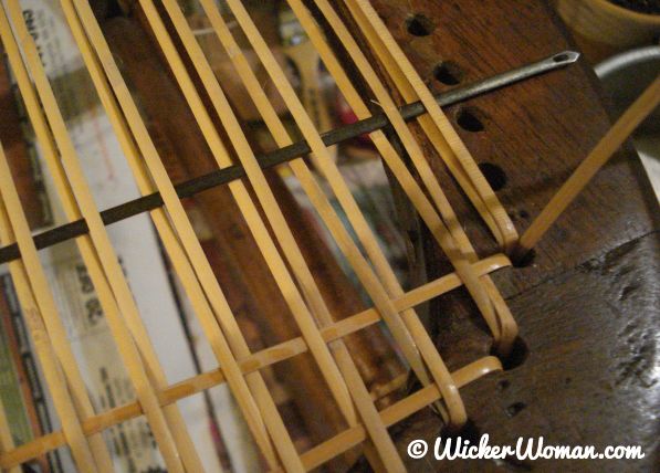 English chair caning needle on hole cane seat.