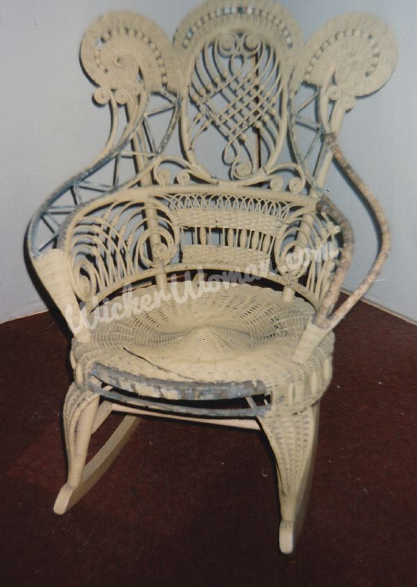 Victorian ram's head wicker rocker before restoration