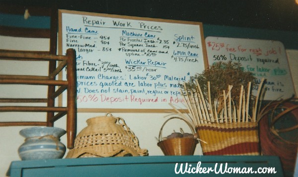 Chair caning repair charges and price sign at The Wicker Woman shop in 1995.