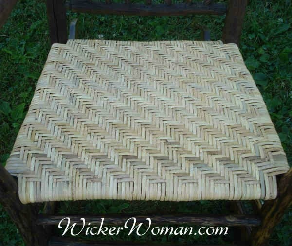 Wide binding cane (6MM) rustic chair seat on hickory frame rocker.