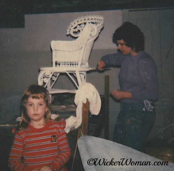 Brush painting a fancy Victorian wicker chair