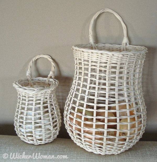 Open weave rattan reed Garlic & Onion baskets designed and woven by Cathryn Peters hold the contents and keep them fresh for weeks.The set makes the perfect housewarming or wedding gift. 