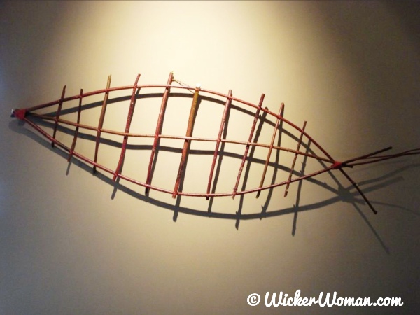 Red Fish, large red dogwood flat, basketry wall art made by Cathryn Peters.