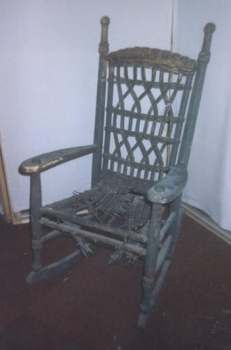 Damaged wicker rocker